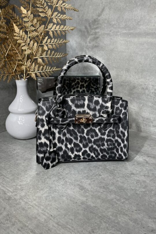 Leo Tasche in Schwarz mit passendem Schultergurt